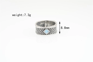 Macro shot of S925 sterling silver ring showing 8.8mm width and blue stone inlay