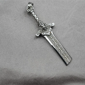 Punk style sword pendant necklace with lion head and Nordic geometric patterns on gray background