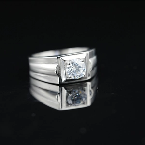 Classic silver moissanite ring for men with wide ribbed band on black background