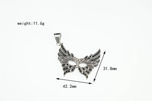 Detailed view of silver butterfly wing pendant with black zircon, 42.2mm x 31.8mm size