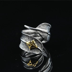 Retro feather open ring with golden cross emblem in vintage silver finish for men and women