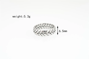Detail view of woven texture silver ring with 6.5mm width and 5.3g weight technical specs