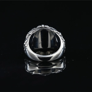 Gothic silver bat ring with gemstone inlay and retro punk style floral patterns