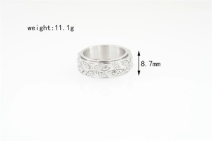 Detailed view of 8.7mm wide titanium steel ring showing intricate Eye of Horus carvings