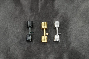 Three dumbbell pendants in black, gold, and silver finishes for fitness necklaces