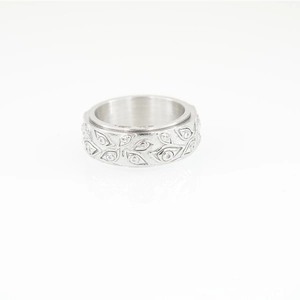 Minimalist titanium steel Eye of Horus ring with engraved leaf patterns on silver band