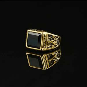 Vintage gold Masonic ring with square black onyx stone and engraved side detailing