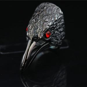 Retro eagle head ring with red zircon eyes and realistic feather texture engraving