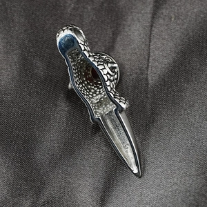 Punk style stainless steel dragon claw dagger pendant with vibrant red gemstone inlay