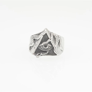 Gothic punk silver octopus tentacle ring featuring the mystical Eye of Horus triangle