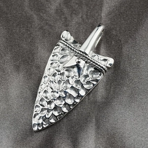 Retro vintage arrow spear pendant with hammered metal texture and star detail