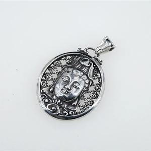 Vintage silver-style Guanyin Buddha oval hollow pendant in stainless steel for necklaces