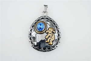 Detail view of retro teardrop pendant with blue gemstone and Kokopelli engraving