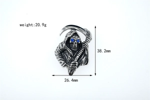 Gothic reaper pendant detail with blue gemstone eyes and precise dimensions of 38.2mm