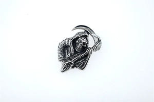 Detailed view of the oxidized silver Grim Reaper pendant featuring a scythe and gothic robe