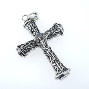 Vintage silver crucifix cross pendant with ornate filigree engraving and Jesus figure