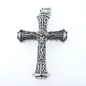 Vintage oxidized silver cross necklace with intricate floral patterns and Jesus relief