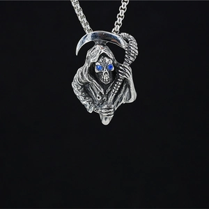 Grim Reaper skull pendant necklace with blue stones and box chain in gothic style