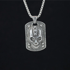 Gothic skull dog tag necklace in vintage silver finish with a durable box chain