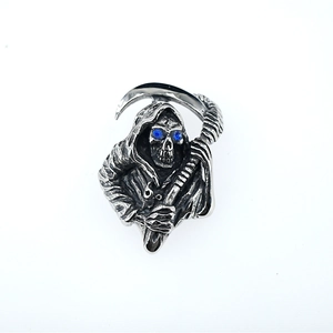 Gothic silver Grim Reaper pendant with blue crystal eyes and a detailed scythe scythe blade