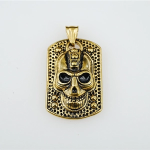 Retro punk gothic skull pendant in gold finish with vintage metal texture and details