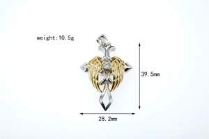 Detail view of cross pendant with gold feather wings showing 39.5mm height dimensions