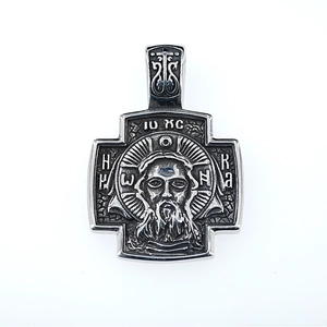 Vintage stainless steel cross necklace featuring a detailed religious Jesus engraving