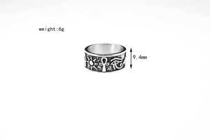 Detail view of vintage steel ring showing Eye of Horus engraving and 9.4mm width dimension