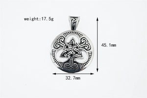 Macro view of vintage Viking Celtic knot pendant with antique finish and steel texture