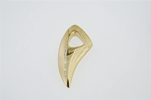 Polished golden titanium steel wolf tooth pendant with sharp abstract lines and glossy finish