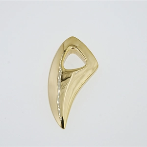 Modern gold-plated wolf tooth pendant necklace with polished finish on white background
