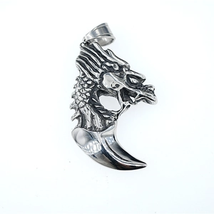 Vintage stainless steel dragon claw pendant with intricate scales and horn shape