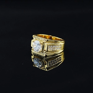Elegant gold men's moissanite ring with large round stone and pavé diamond accents