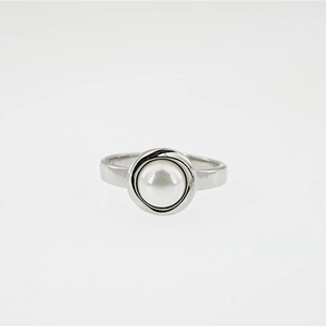 Minimalist silver ring with a white pearl on a smooth metallic band for men and women