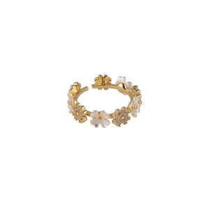 Adjustable floral ring with shell petals and sparkling zircon stones on gold-plated band