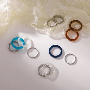 Set of 11 stylish acrylic and silver metal chain rings in mixed vibrant colors