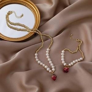 Handmade necklace and bracelet set with real red rose buds and elegant white pearls