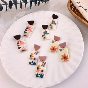 Handmade polymer clay floral earrings set with vintage 3D relief flower patterns
