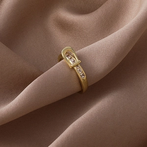 Elegant gold belt buckle ring for women with pave set cubic zirconia stones