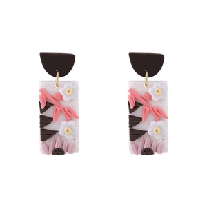 Handmade floral clay drop earrings with pink flowers on white rectangle pendants