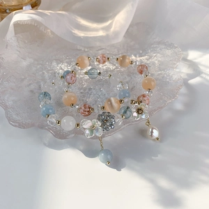 Bracelet en perles de cristal colorées avec breloque fleur et perles de gemmes pastel