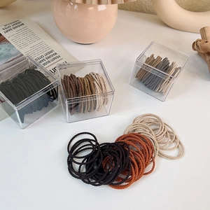 50pcs coffee brown elastic hair ties set in a transparent acrylic storage box for women