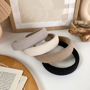 Retro padded headband with pinstripe texture available in grey, white, khaki, and black