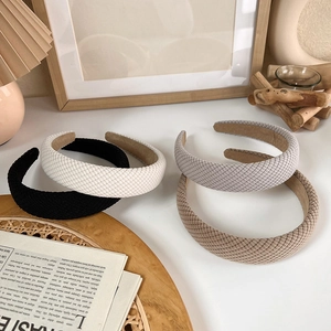 Set of four textured pinstripe headbands in black, grey, brown and white colors