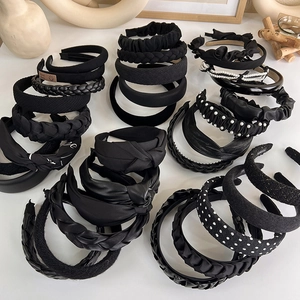 Elegant black knit and pearl headband set for women with diverse stylish textures