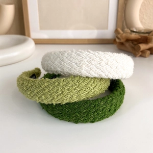 Three-piece set of thick woven tweed headbands in white, light green and dark green colors