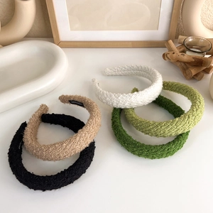 Five-piece set of knitted wide headbands in neutral colors with handmade woven texture