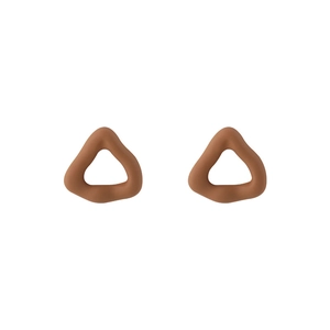 Detail of matte brown triangular stud earrings with minimalist geometric design