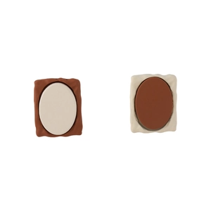 Artistic vintage brown stud earrings with wavy edges and contrasting two-tone oval design