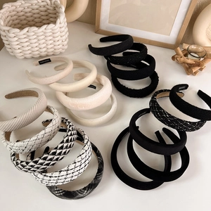 French style padded headbands in black, white, and tweed patterns for hair styling